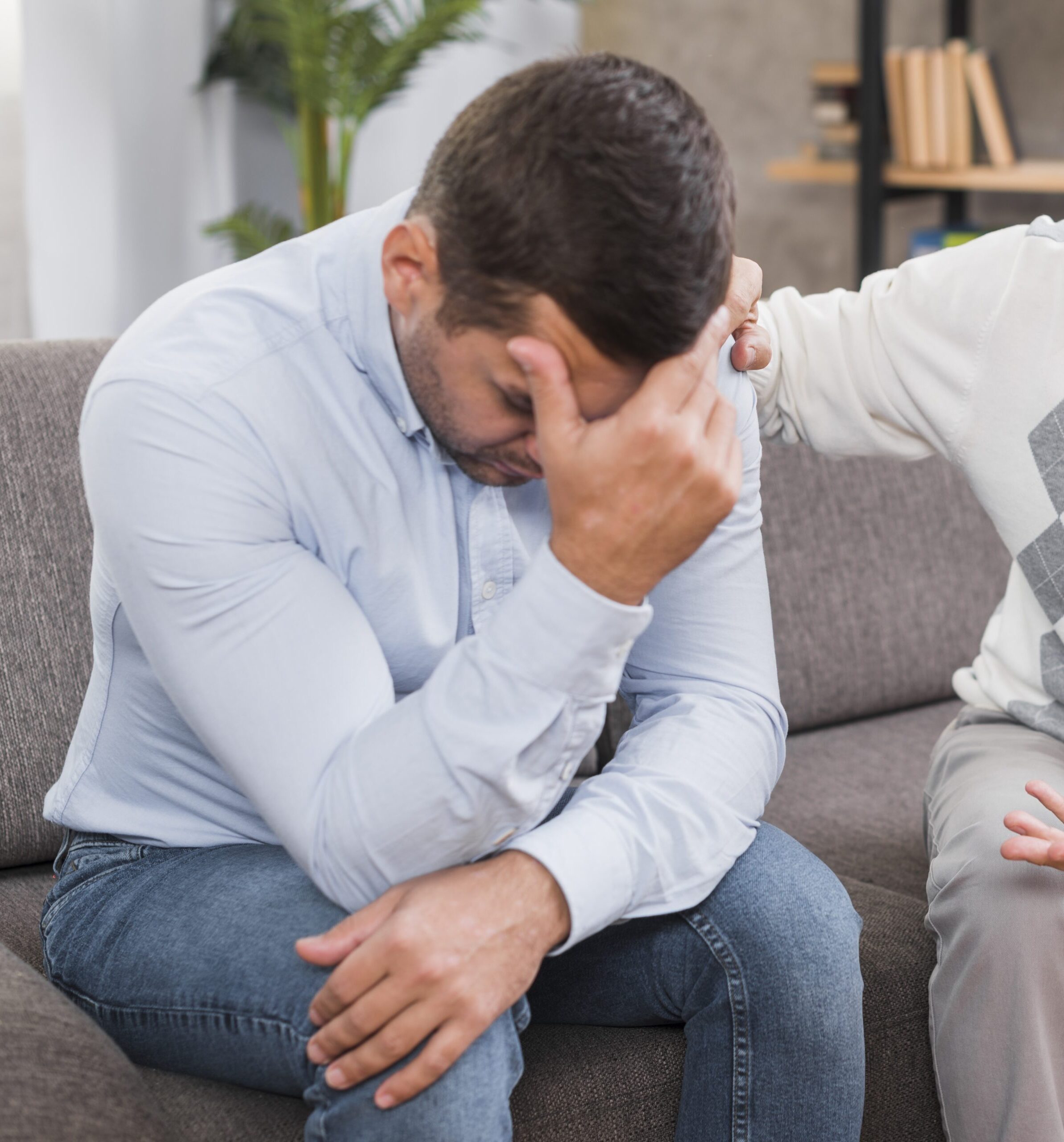 front-view-father-son-sitting-couch