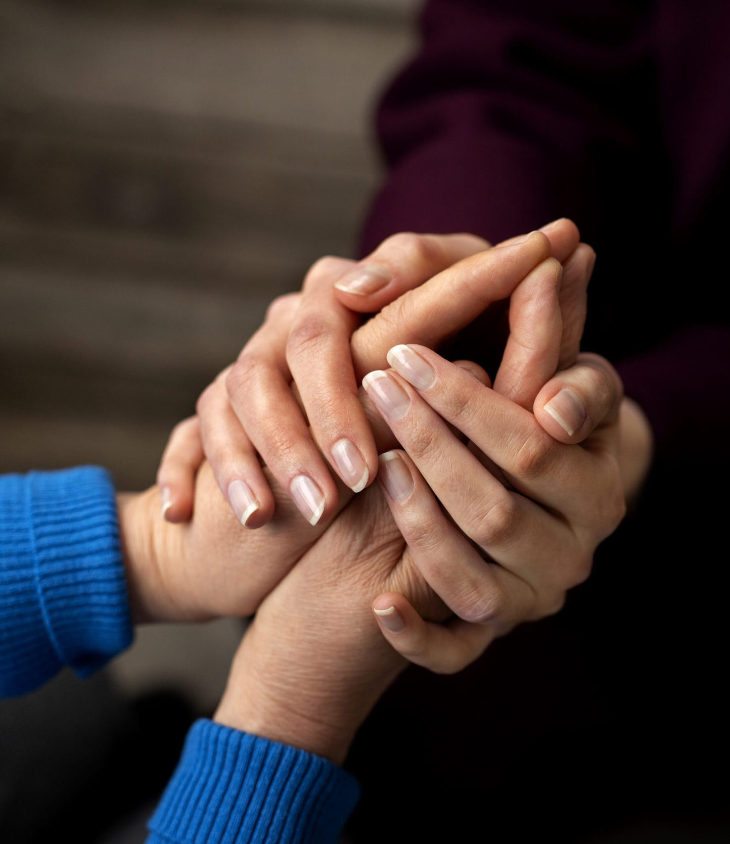 hands-holding-each-other-support